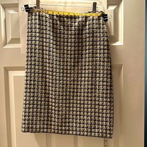 CUSTOM-MADE skirt, zipper closure on left side. Cream, black, and taupe print.